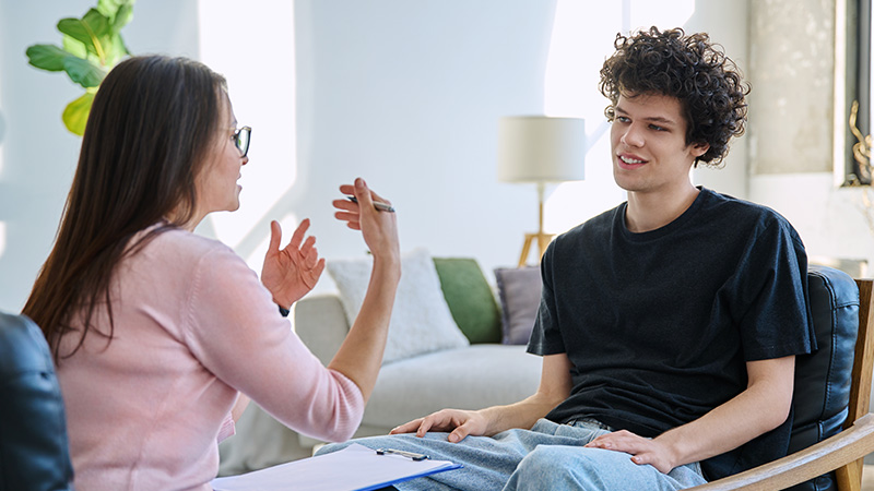 Counselor talking to a client
